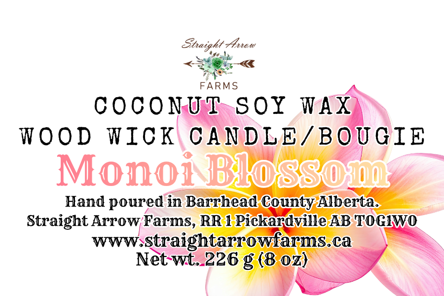 Coconut soy wax wood wick candle packaging with branding and product details, Monoi Blossom scent.