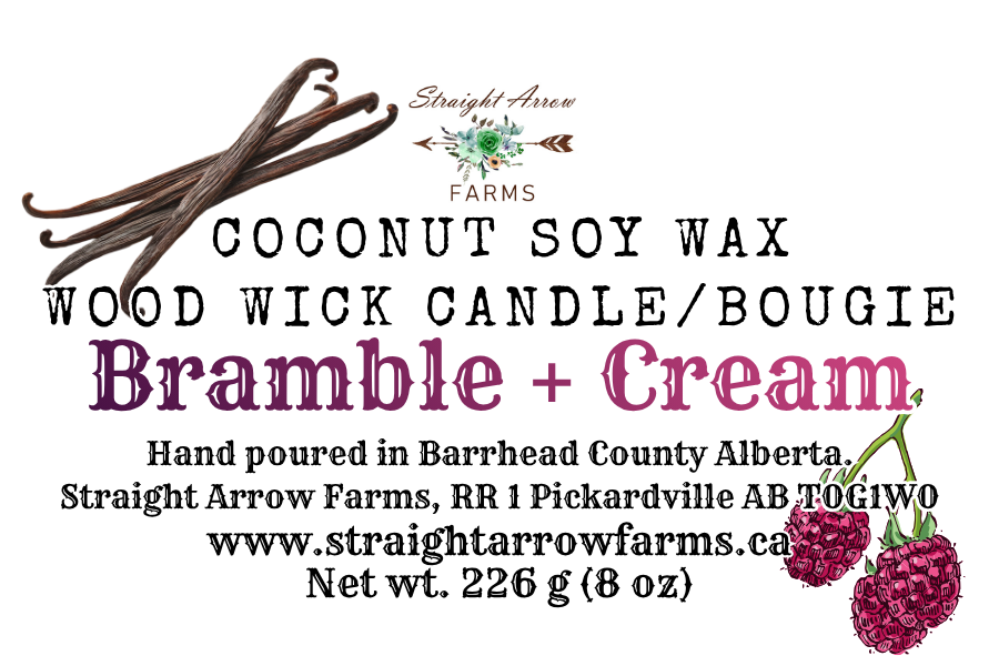 Label for a coconut soy wax wood wick candle with vanilla beans and raspberries, featuring Straight Arrow Farms branding.