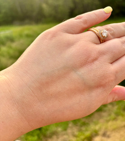 Back of hand after applying tallow cream, showing fully absorbed moisturizer with no greasy residue, natural outdoor background