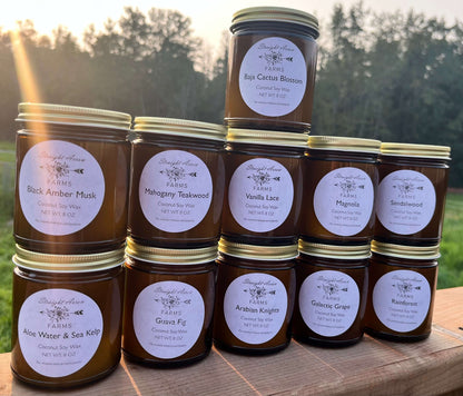 amber glass jars, metal lids and expertly scented hand poured small batch candles.