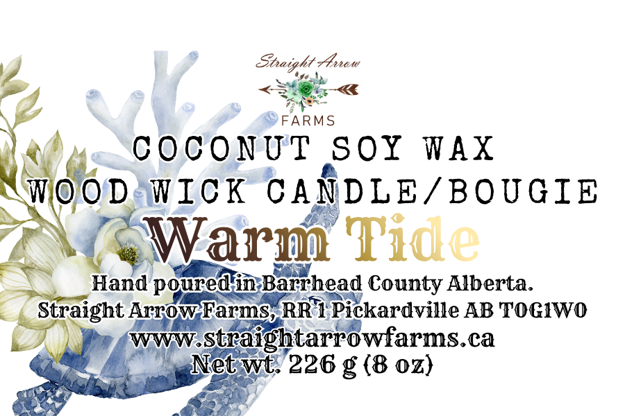 Label for a coconut soy wax wood wick candle "Warm Tide" scent, with decorative elements and text.