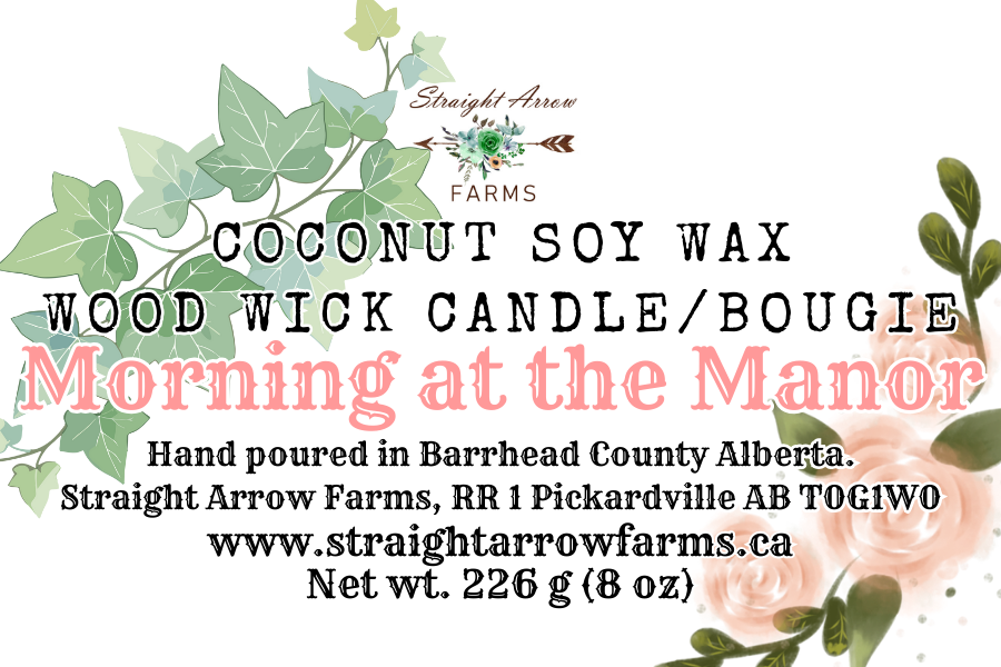 Coconut soy wax wood wick candle packaging with branding and product details, Morning at the Manor scent.