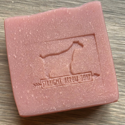 Blackberry Sage Goat Milk Soap with a goat logo, showcasing a pink bar of soap from Straight Arrow Soap.